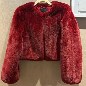 BCBG XS faux fur lush cropped coat in burgundy, wine color